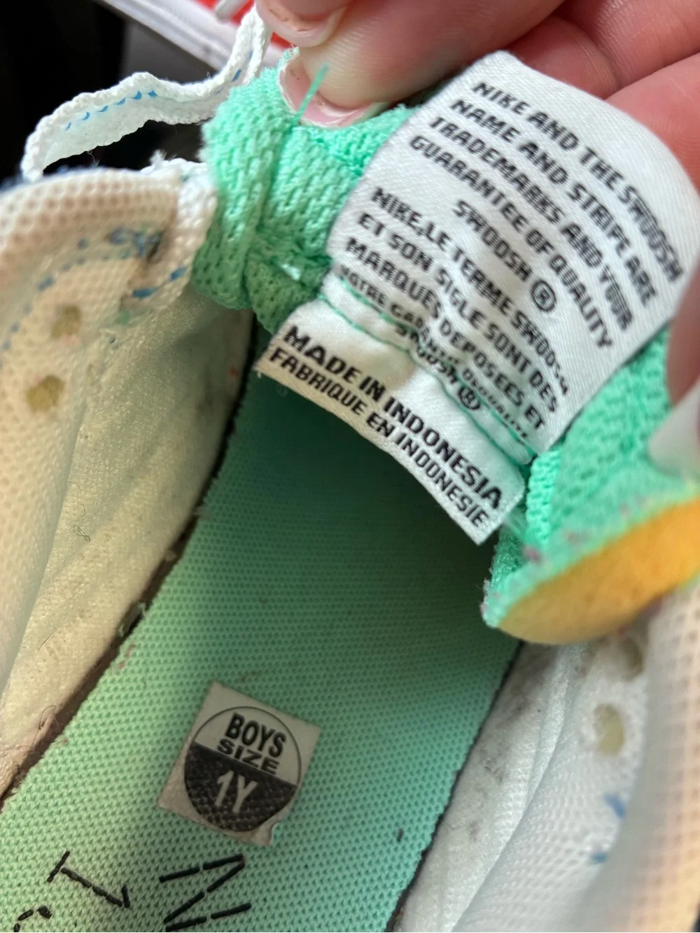 Nike vibrant turquoise